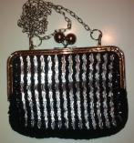 Tölkinvedin musta hopea iltalaukku